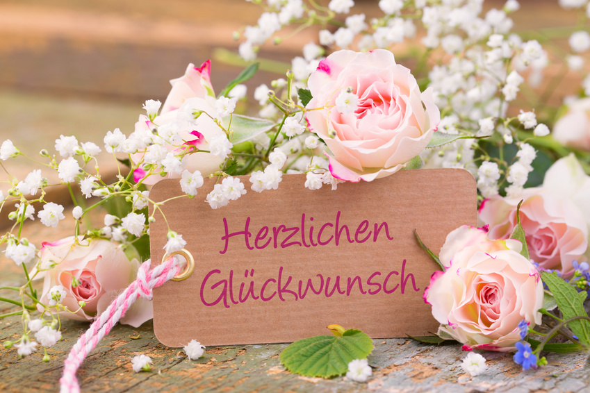 Herzlichen Glckwunsch - Blumenstrau mit Karte